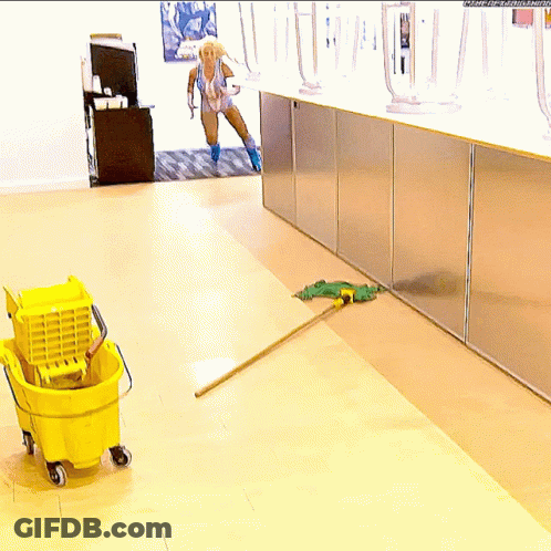 Woman In Bathing Suit Mopping Floor With Yellow Mop GIF