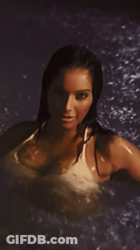 Woman In Bathing Suit Standing In Pool GIF