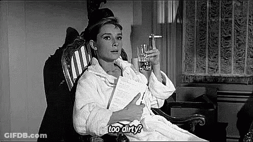 Woman In Bathrobe Rocking With Water And Paper GIF