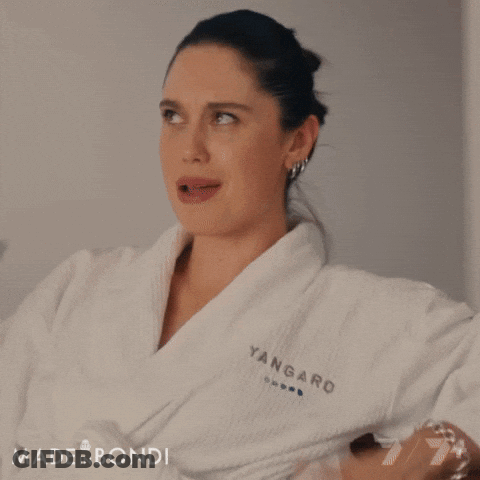 Woman In Bathrobe Saying It's My Birthday GIF