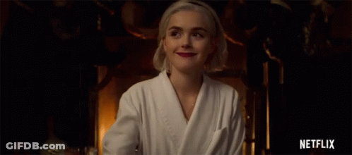 Woman In Bathrobe Smiling Holding Glass Netflix GIF