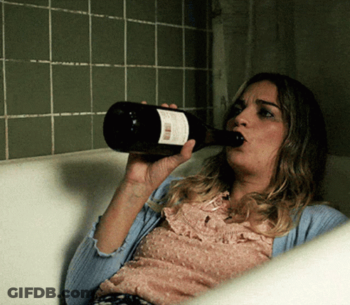 Woman In Bathtub Drinking White Label Bottle GIF