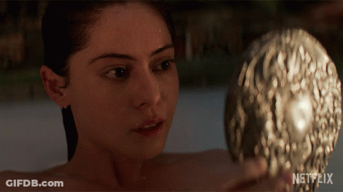 Woman In Bathtub Looking At Herself In Mirror With Netflix Logo GIF