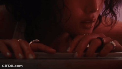 Woman In Bathtub Looking At Mirror GIF