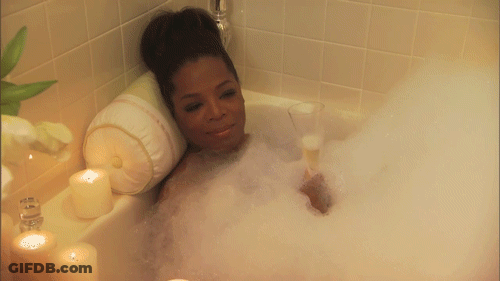 Woman In Bathtub With Glass Of Wine GIF