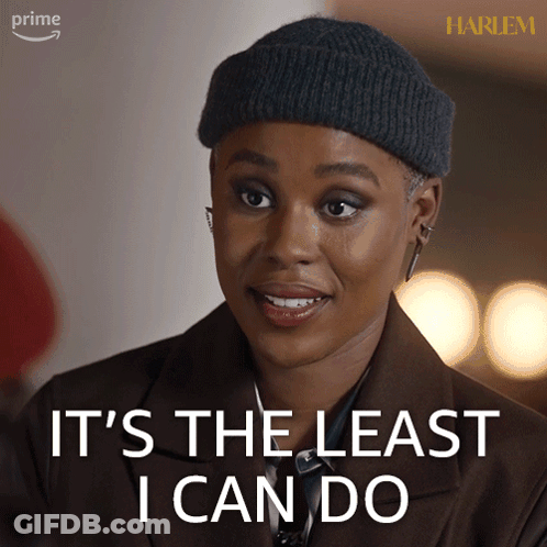 Woman In Beanie And Brown Jacket Says Least I Can Do GIF