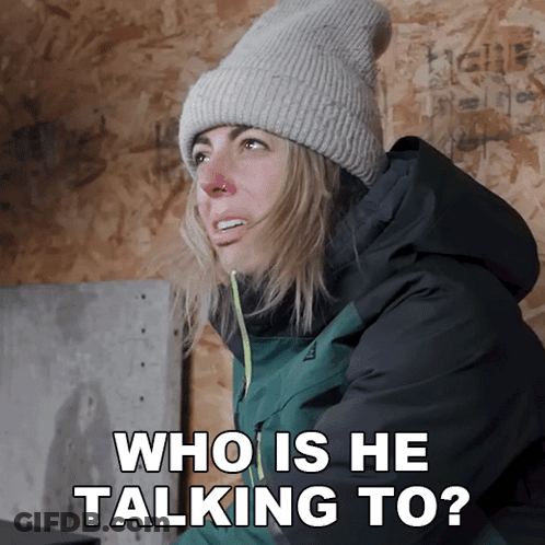 Woman In Beanie Asking Who Is He Talking To GIF