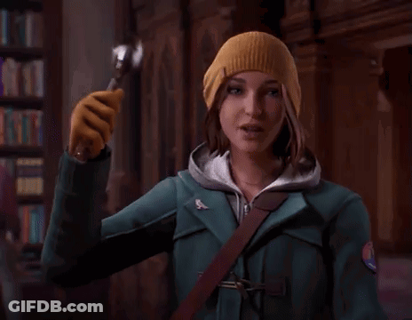 Woman In Beanie Holding Spoon GIF