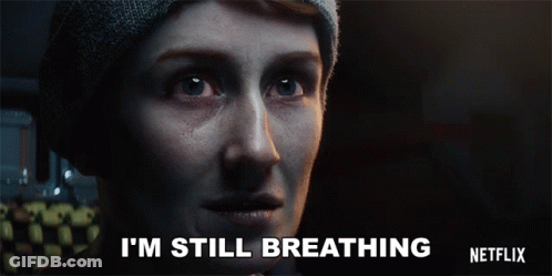 Woman In Beanie Says I'm Still Breathing Netflix Ad GIF