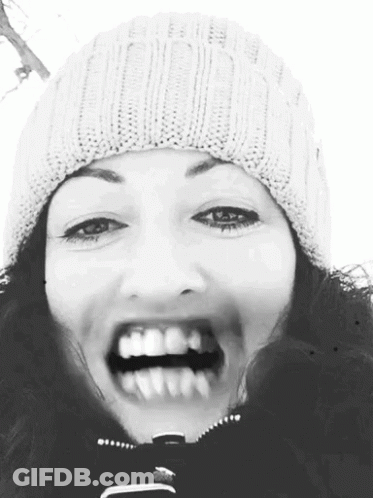 Woman In Beanie Smiling GIF