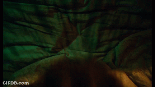 Woman In Bed Wearing Chicago Shirt GIF