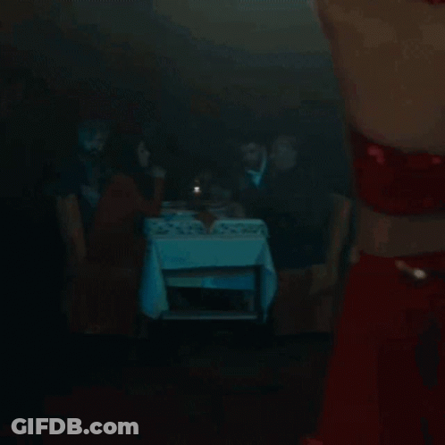 Woman In Belly Dance Costume Dancing With Hands In Hair GIF