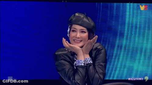 Woman In Beret And Headphones Smiling On TV GIF