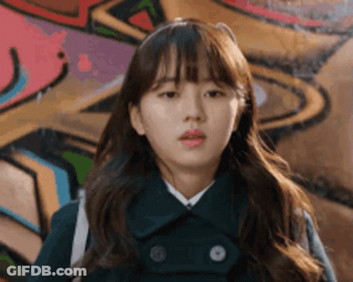 Woman In Beret And Sailor Suit Close Up GIF