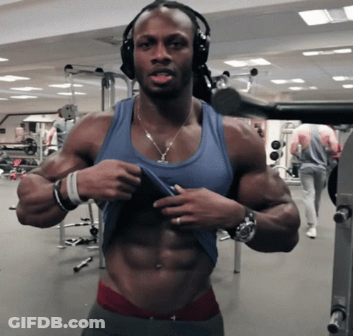 Woman In Bikini Adjusting Top In Locker Room GIF