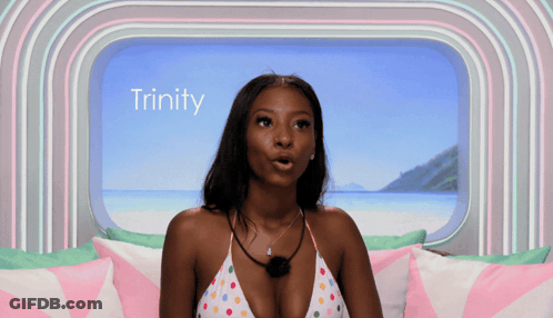 Woman In Bikini By Window With Trinity GIF