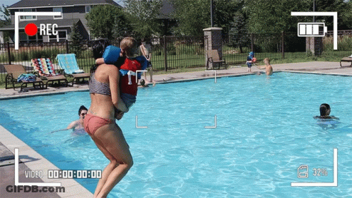 Woman In Bikini Carrying Child To Pool GIF