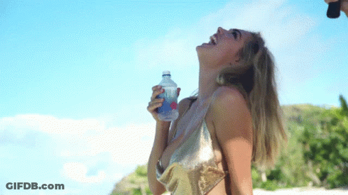Woman In Bikini Holding Water Bottle GIF
