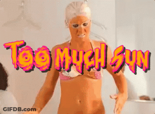 Woman In Bikini In Front Of Too Much Sun Sign GIF