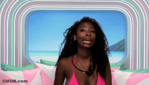 Woman In Bikini Next To Man In Chair GIF