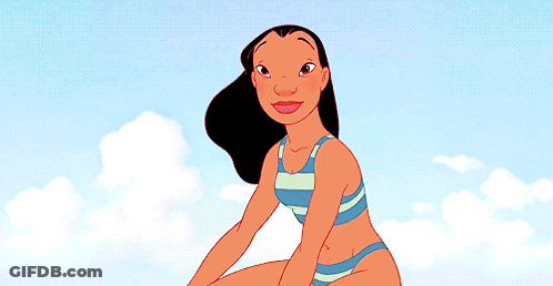 Woman In Bikini Sitting On Beach GIF