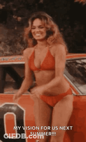 Woman In Bikini Standing In Front Of Red Car GIF