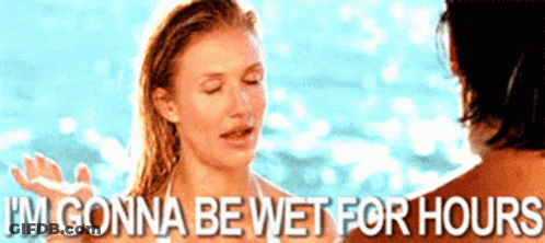 Woman In Bikini Talking To Man In Bathing Suit GIF