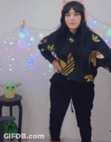 Woman In Black Adidas Near Green Baby Yoda GIF