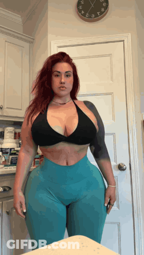 Woman In Black And Blue At Clock 10:10 GIF