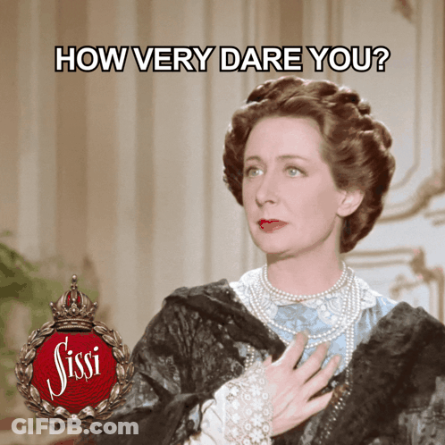 Woman In Black And Blue Dress Saying How Very Dare You GIF
