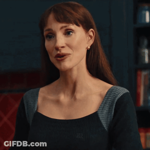 Woman In Black And Grey Top With ZX Logo GIF