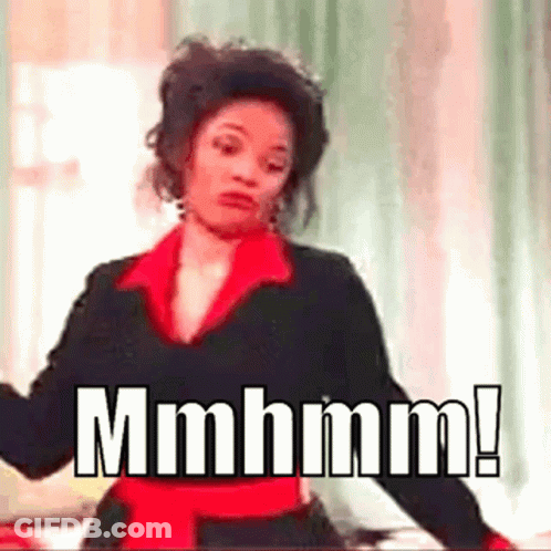 Woman In Black And Red Dress Making Funny Face GIF