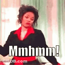 Woman In Black And Red Dress Saying Mmmm GIF