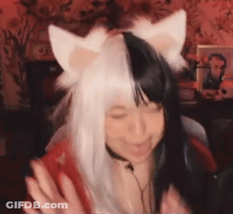 Woman In Black And White Cat Ears Wig At Microphone GIF