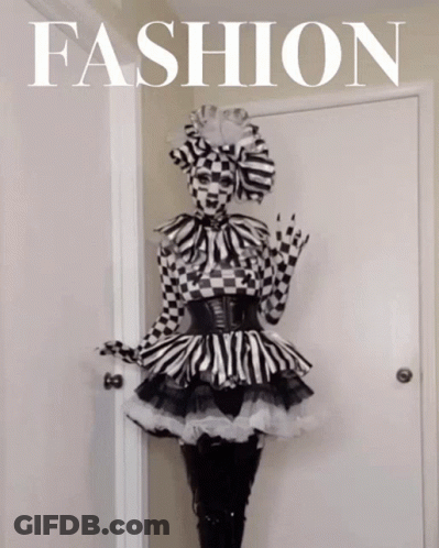 Woman In Black And White Checkered Dress With Fashion Sign GIF