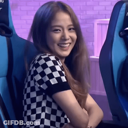 Woman In Black And White Checkered Shirt Smiling GIF