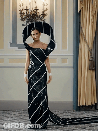 Woman In Black And White Dress GIF