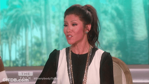 Woman In Black And White Dress On Talk Show GIF