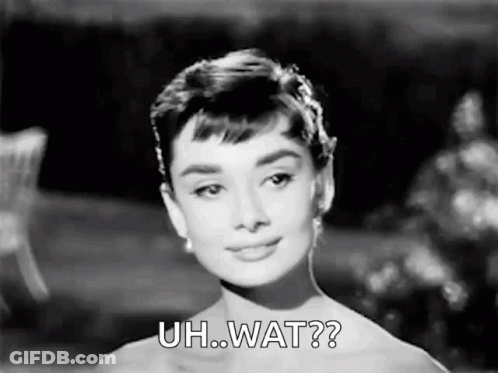 Woman In Black And White Dress Saying Uh Wat GIF