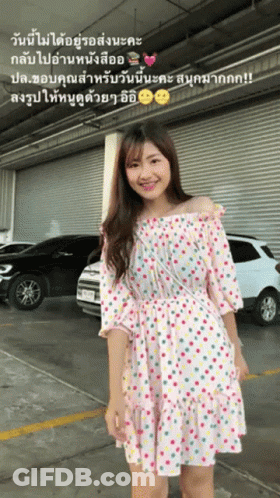 Woman In Black And White Dress With Butterflies GIF