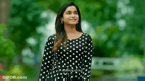 Woman In Black And White Polka Dot Dress GIF