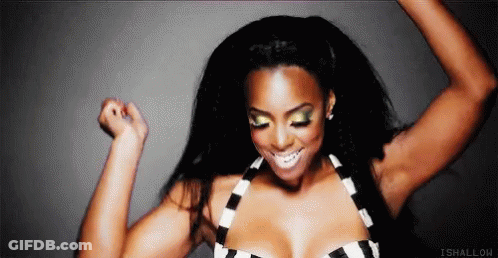 Woman In Black And White Striped Top Dancing With Arms Up GIF