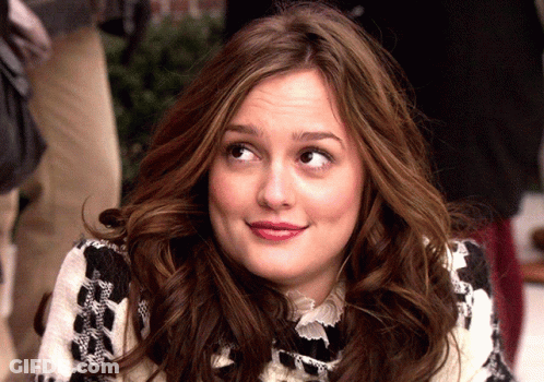 Woman In Black And White Sweater Close Up GIF
