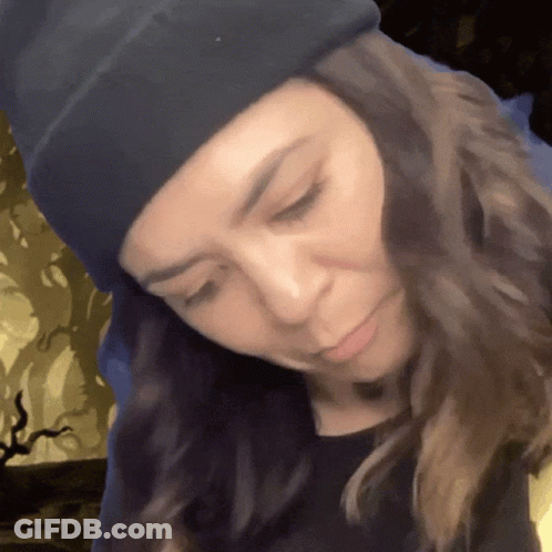Woman In Black Beanie And Shirt GIF