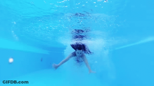 Woman In Black Bikini Swimming GIF