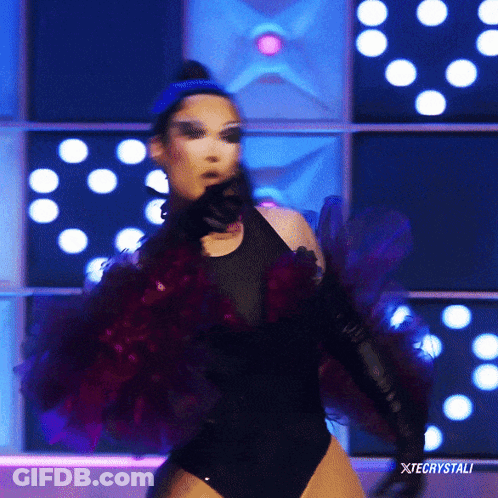 Woman In Black Bodysuit Dancing At Xtechystali Screen GIF