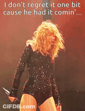 Woman In Black Bodysuit Holding Microphone Says I Don't Regret It GIF