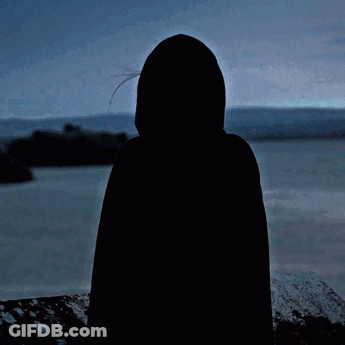 Woman In Black Cape Hugging Someone GIF