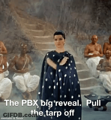 Woman In Black Cape Reveals PBX GIF