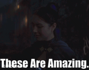 Woman In Black Cape Saying These Are Amazing GIF